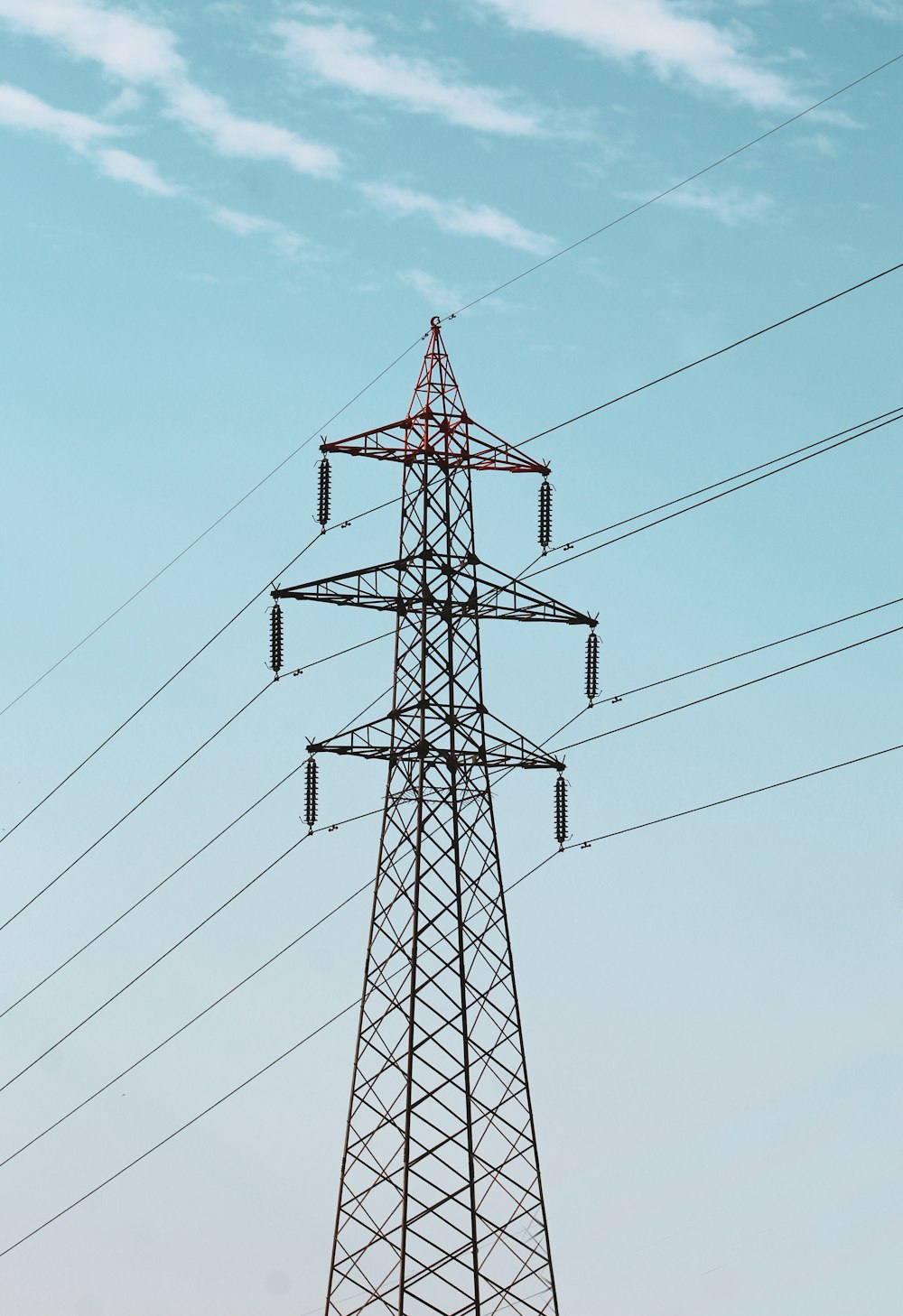 electric transmitter under blue sky