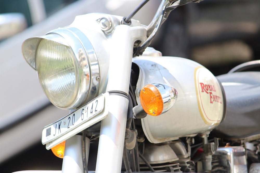 white Royal Enfield motorcycle