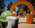 Android holding marshmallow statue