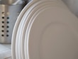 A modern plate holder displayed elegantly.