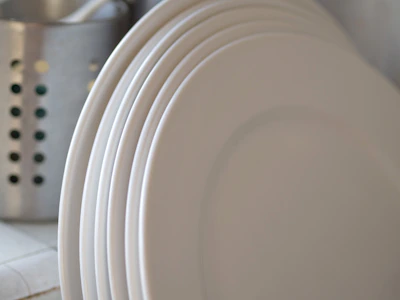Close-up of sturdy, high-quality disposable plates stacked neatly.