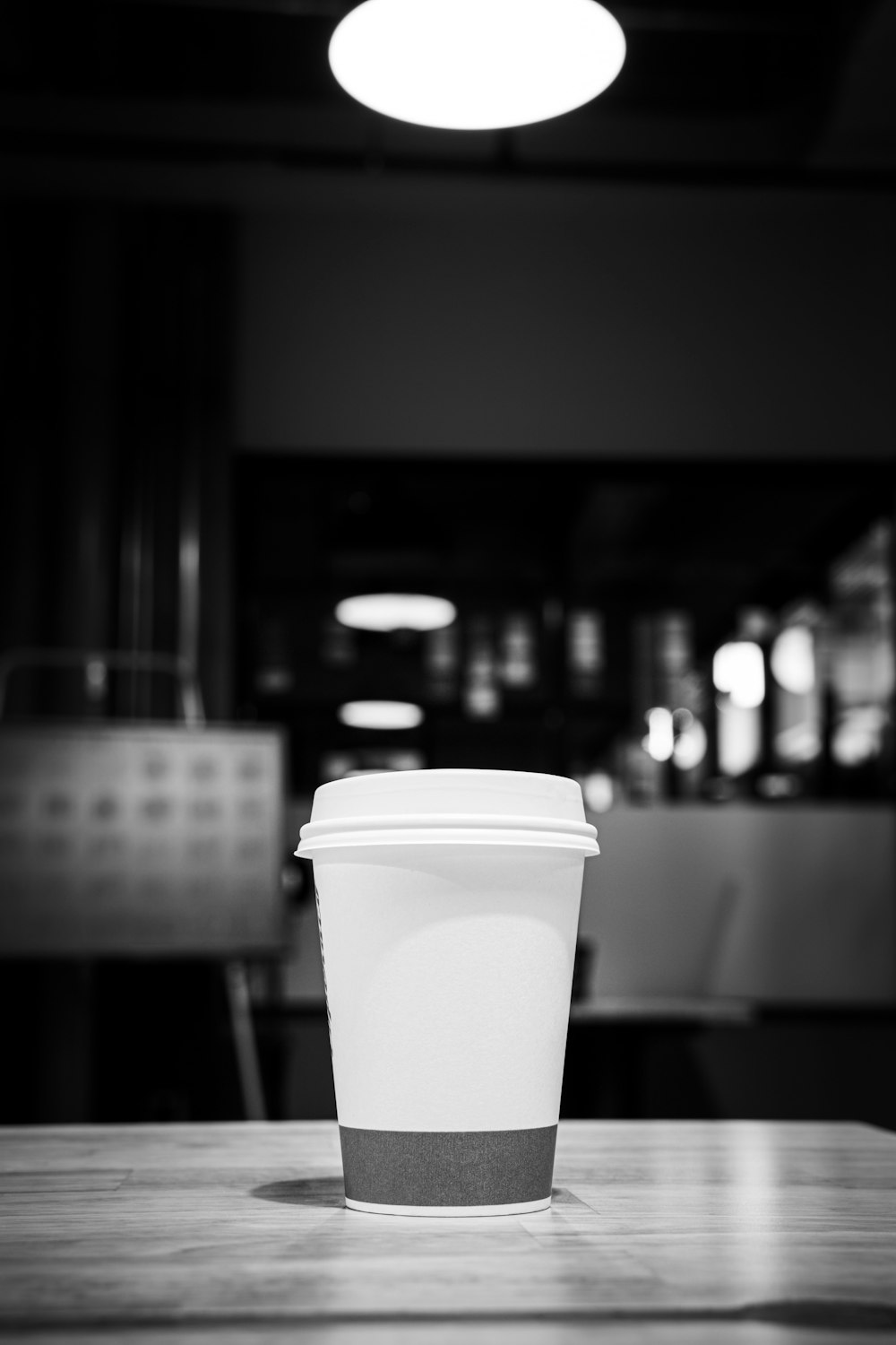 white disposable cup