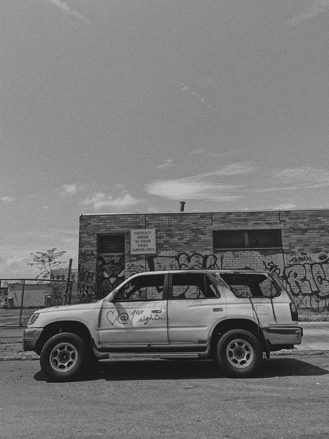 Vehicle beside house