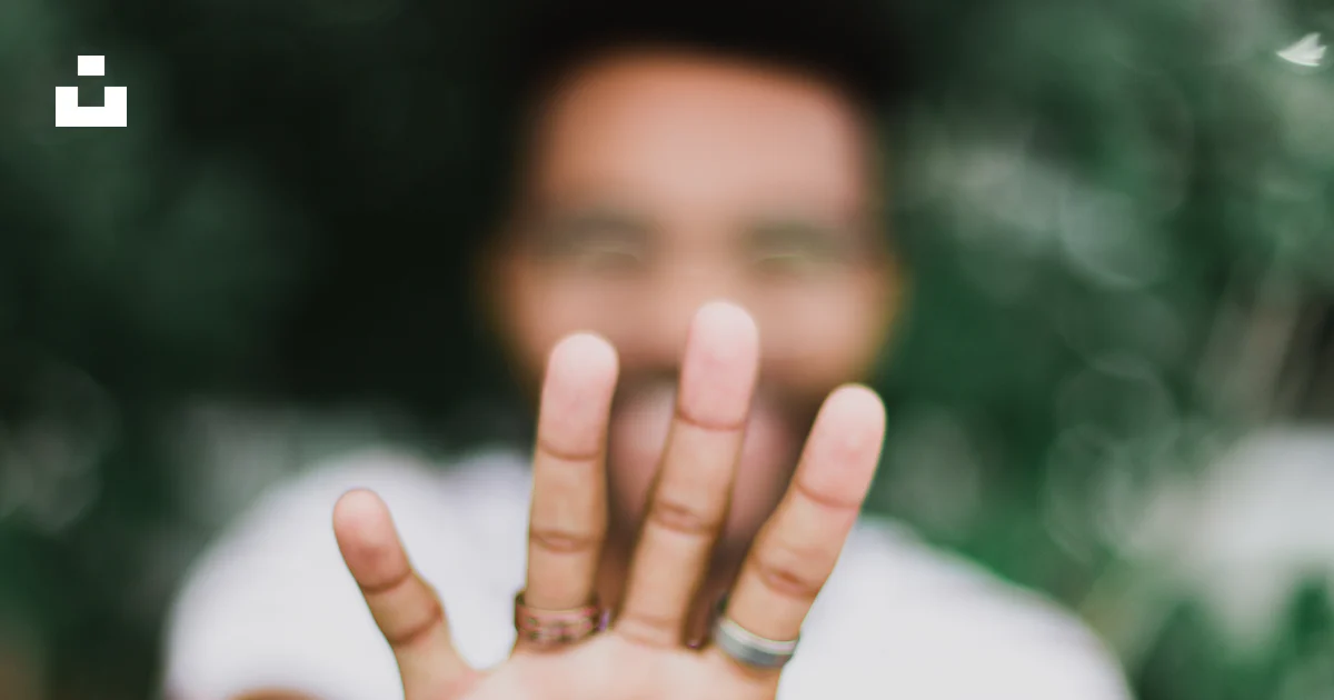 Man Rught Man standing and showing right hand photo – Free Brown Image on Unsplash