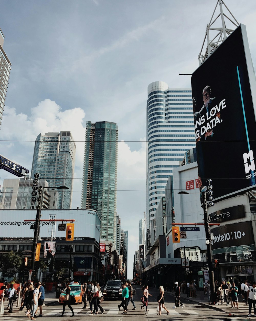 people walking on pedestrian lane at daytime