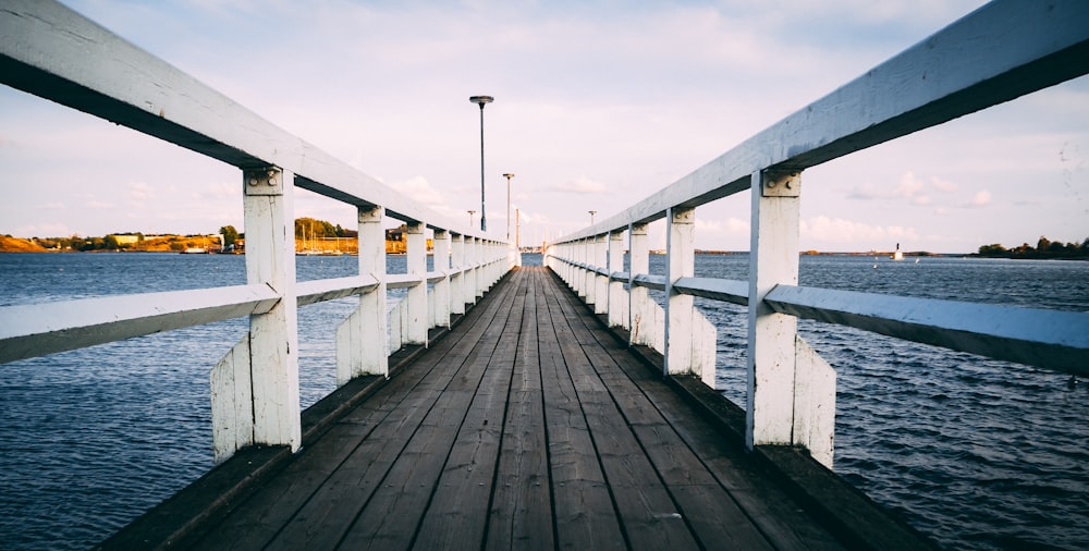 white and black wooden dock at daytime