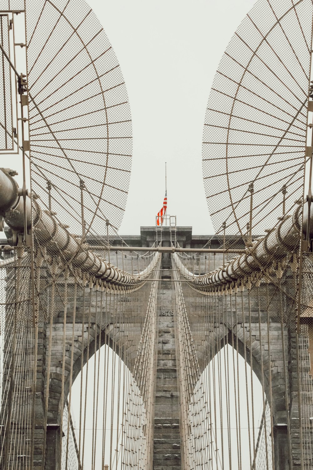 a view of the top of a bridge from below