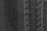 Close-up monochrome shot of architectural details on a luxury Dubai high-rise.