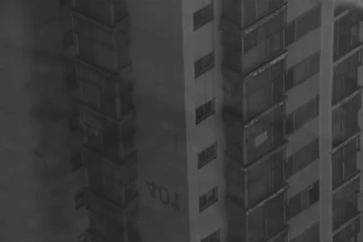 A high-rise building captured in crisp detail for a real estate listing.