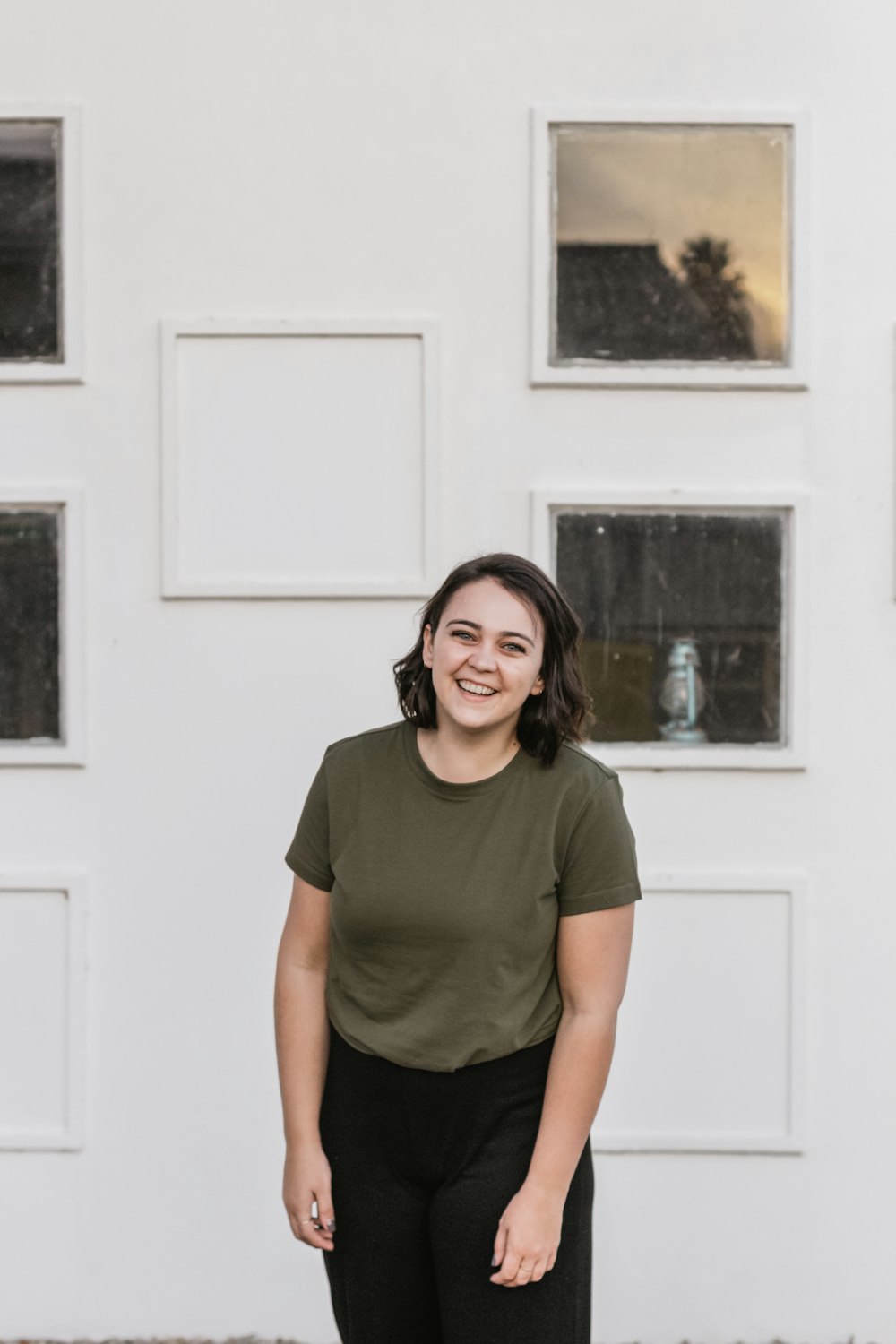 shallow focus photo of woman in black crew-neck T-shirt