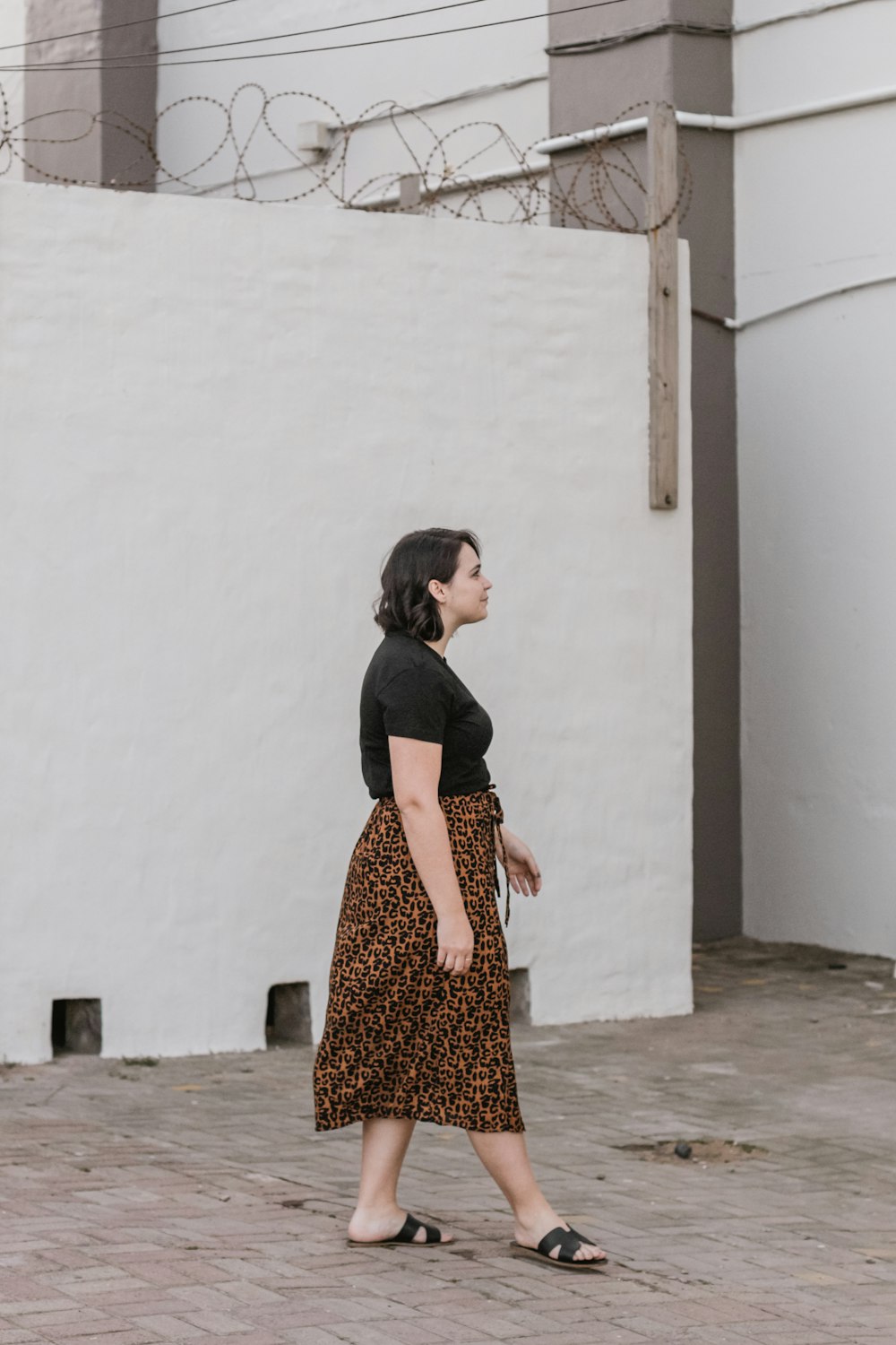 woman standing near wall