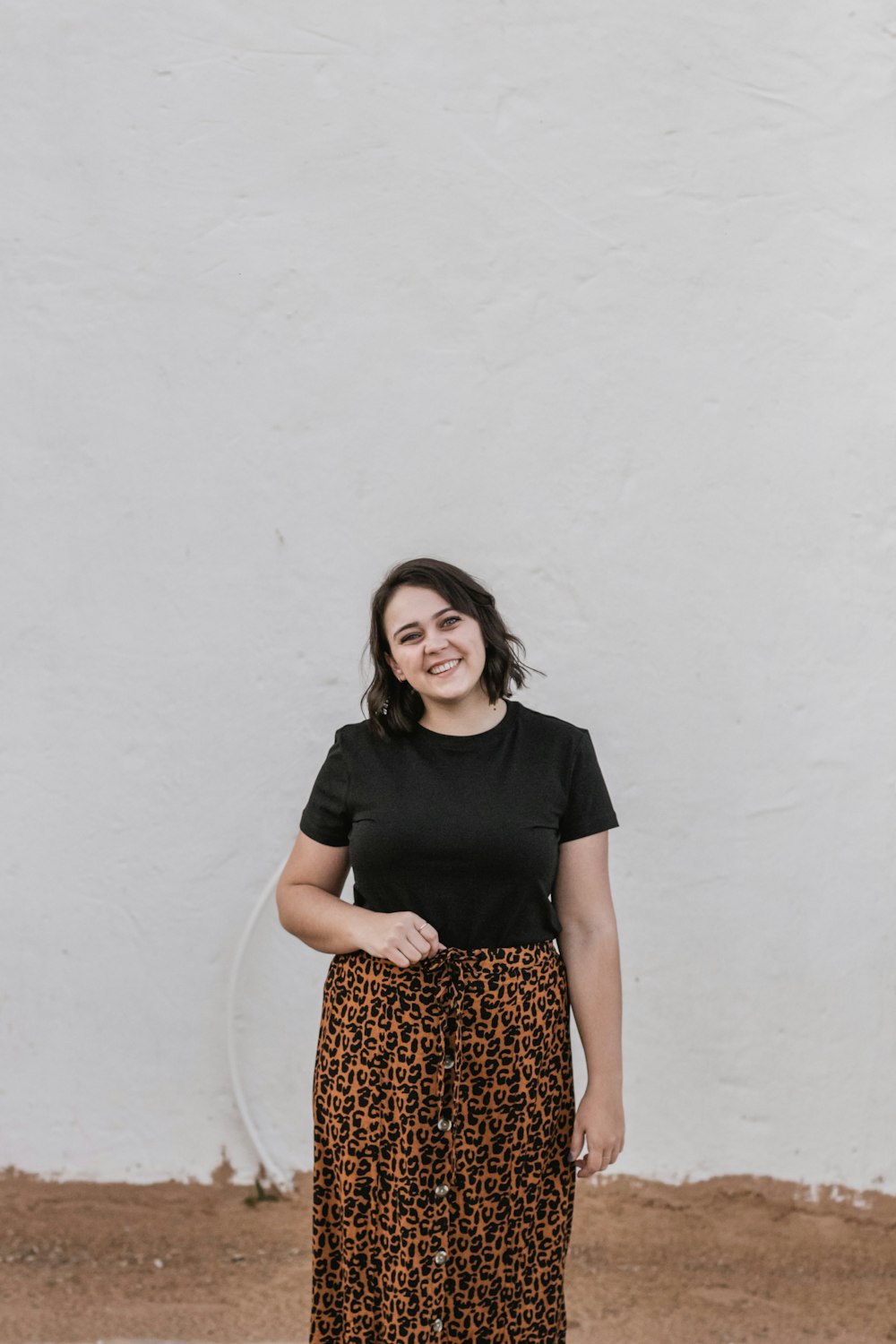 woman standing near wall