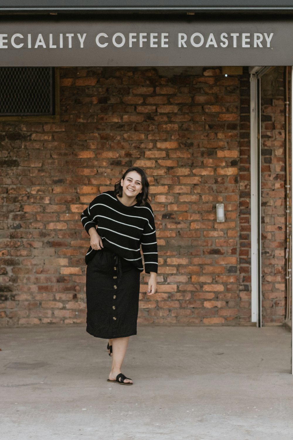 woman standing near wall