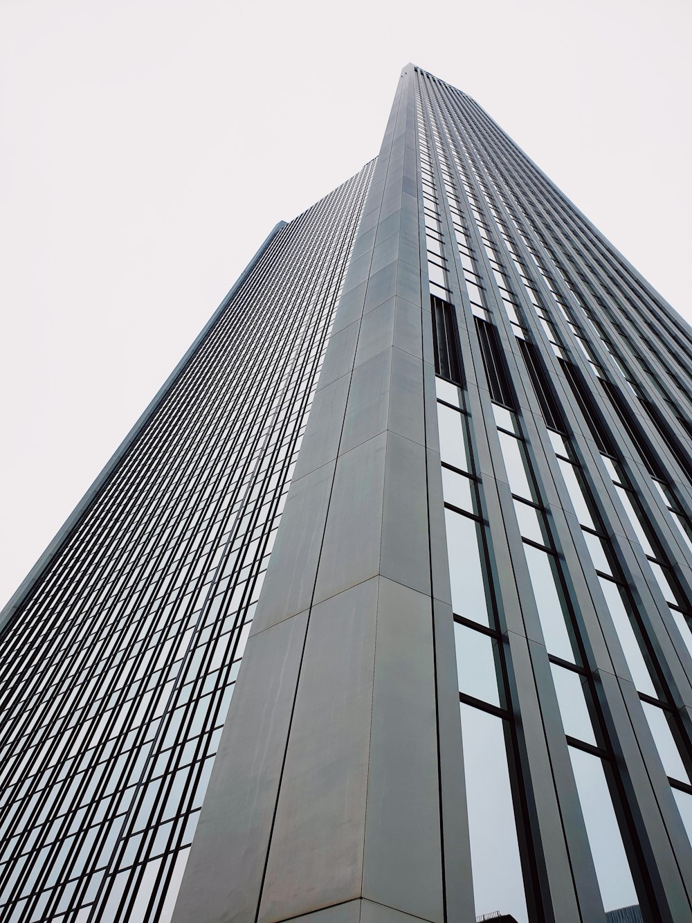 low angle photo of gray building