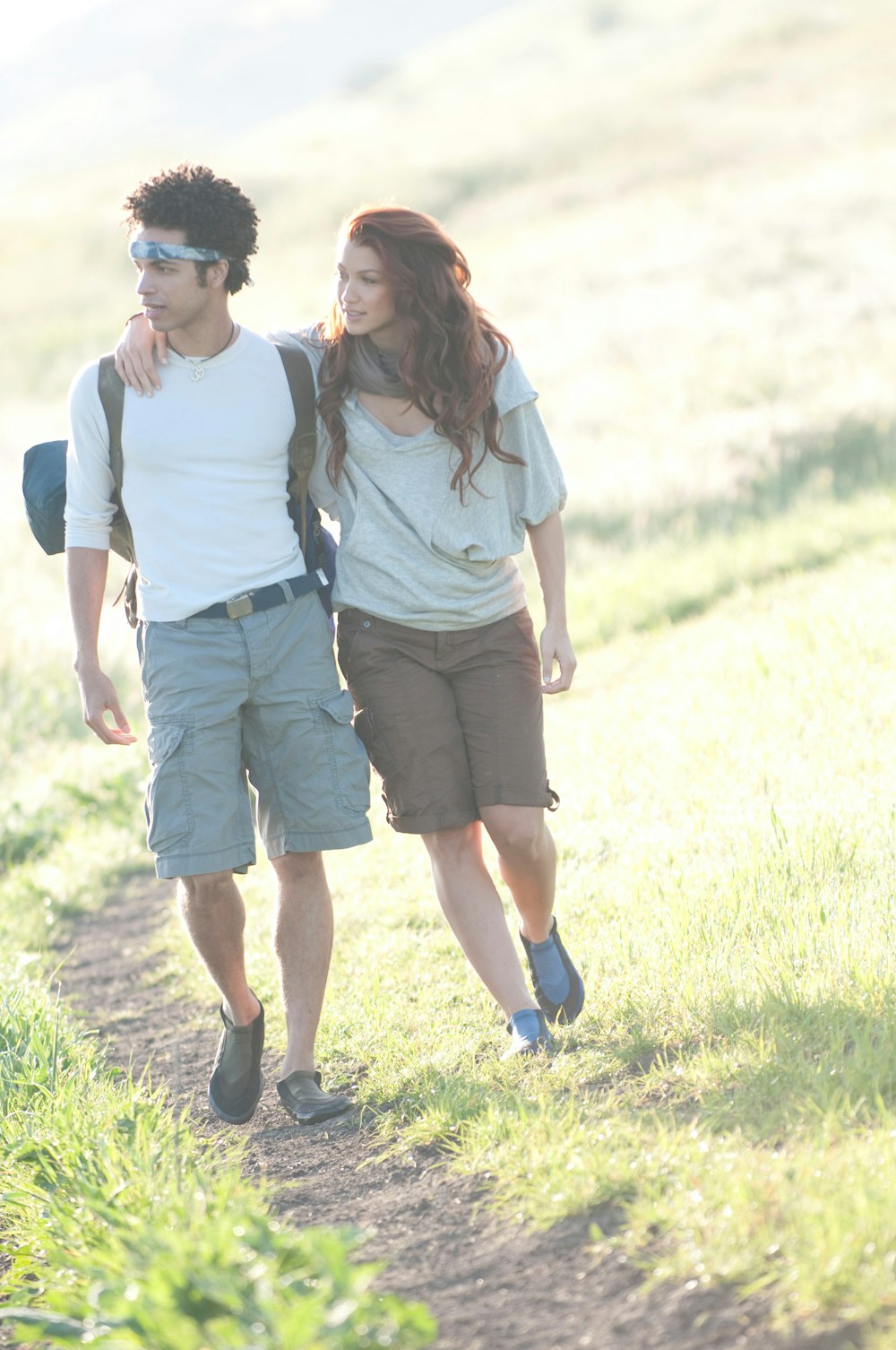 man and woman walking side by side