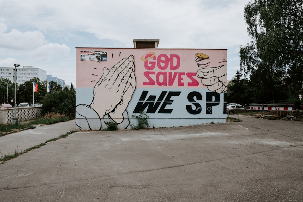 pink and multicolored God saves we SP painting