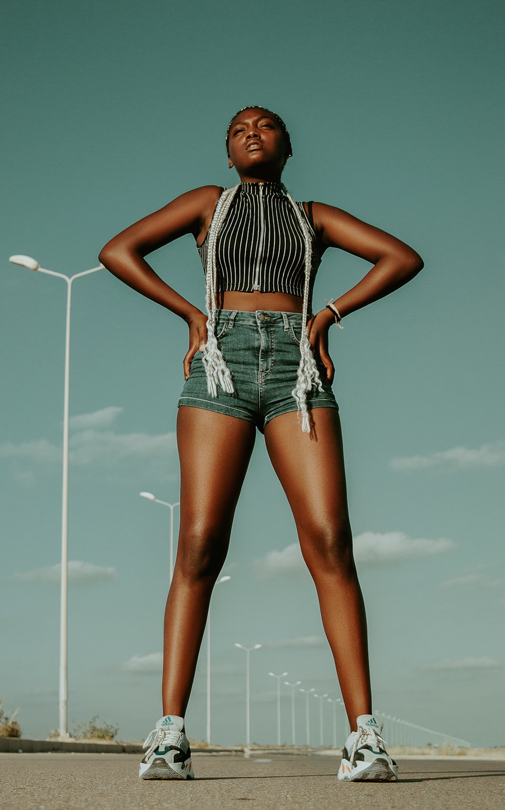 woman standing on road