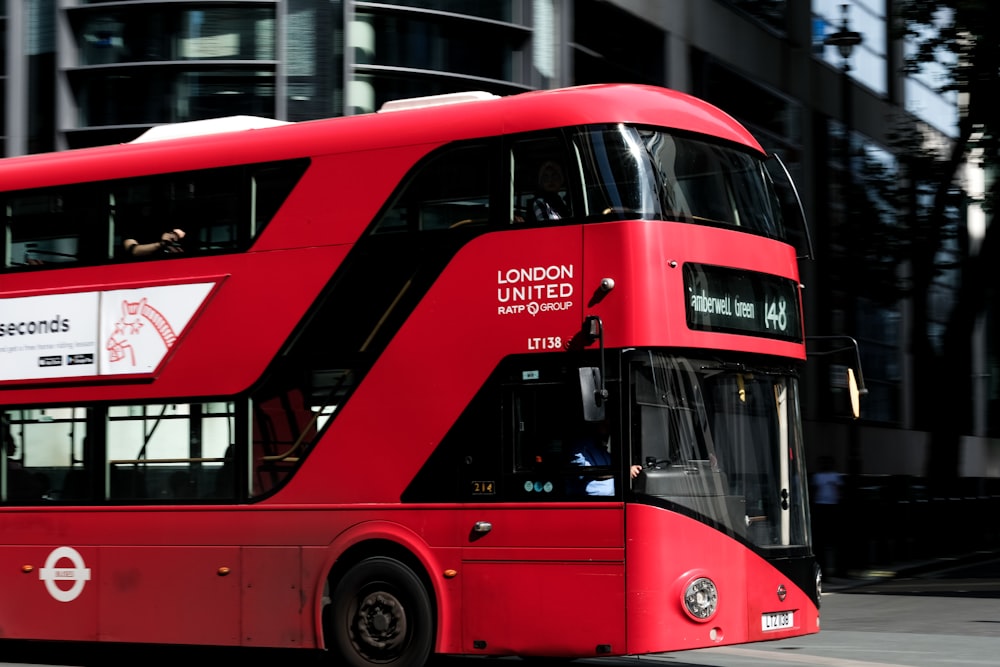 red and black bus near building