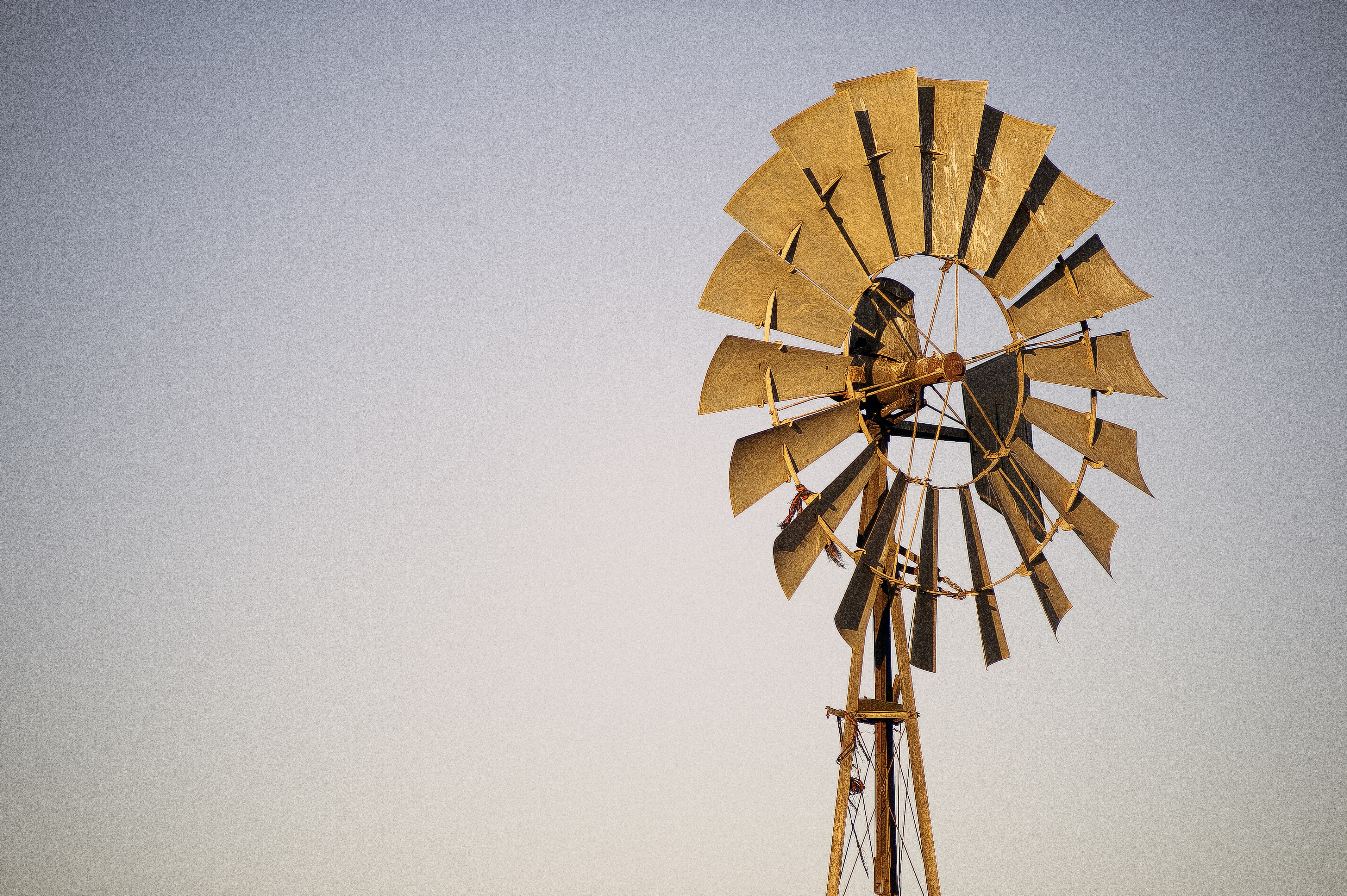 a windmill with a wind indicator on top of it