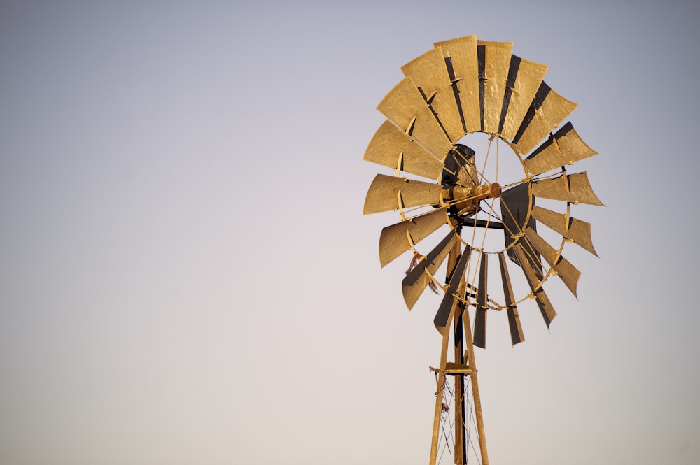 a windmill with a wind indicator on top of it