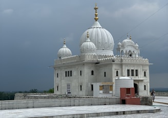 white concrete mosque at daytime