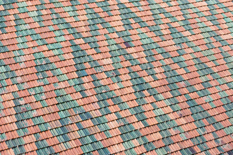 Durable residential roof against the sky