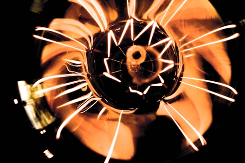 An abstract representation of data flowing into a light bulb.