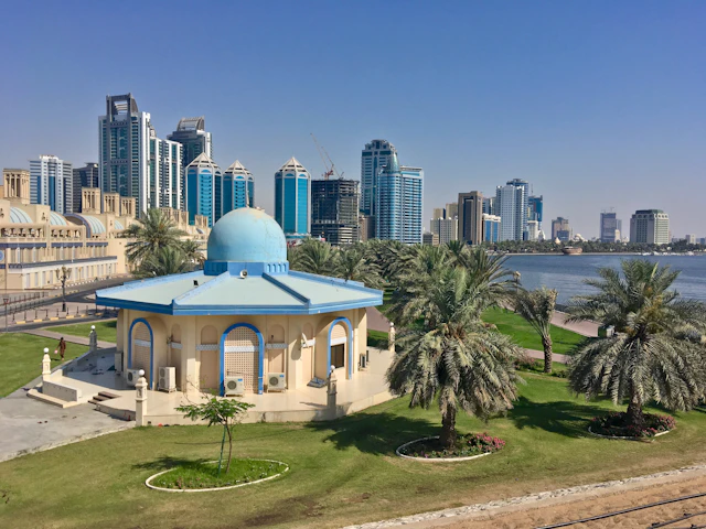 Sharjah waterfront park with the city skyline