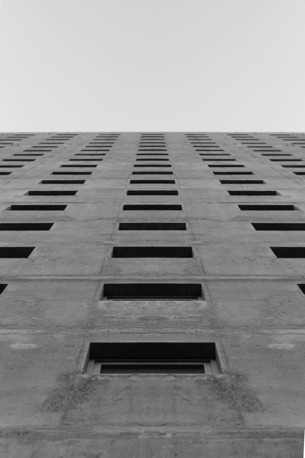 low-angle photography of concrete building at daytime