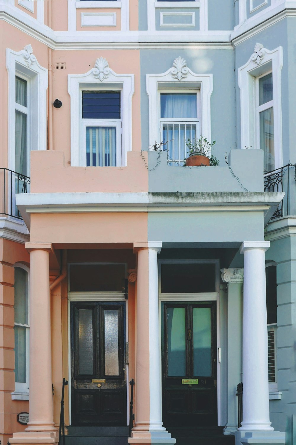 light-blue and orange concrete buildings