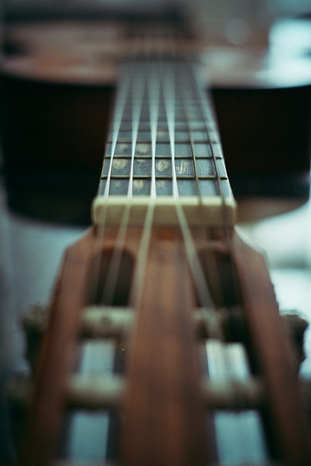 brown acoustic guitar