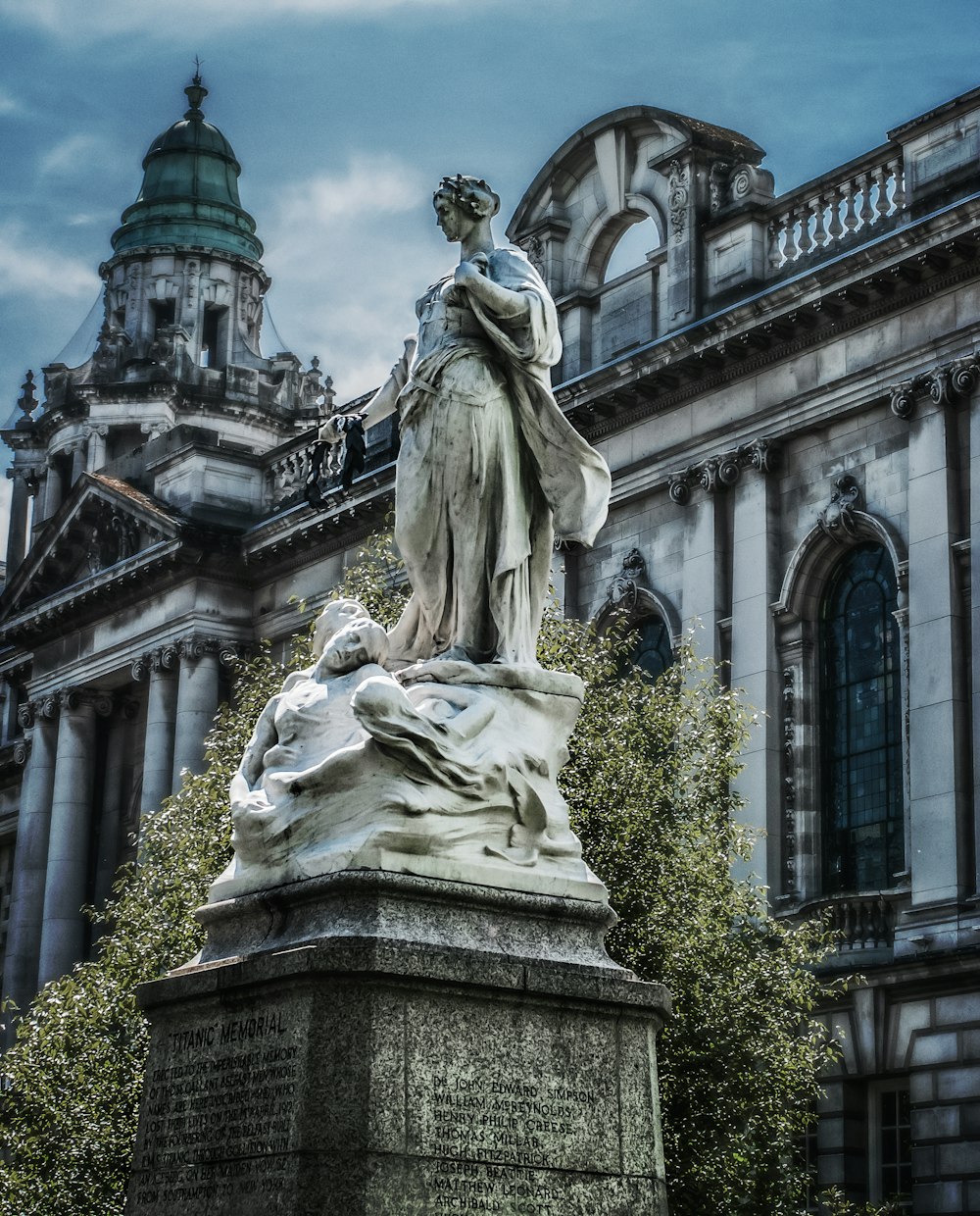 woman standing on rock statue