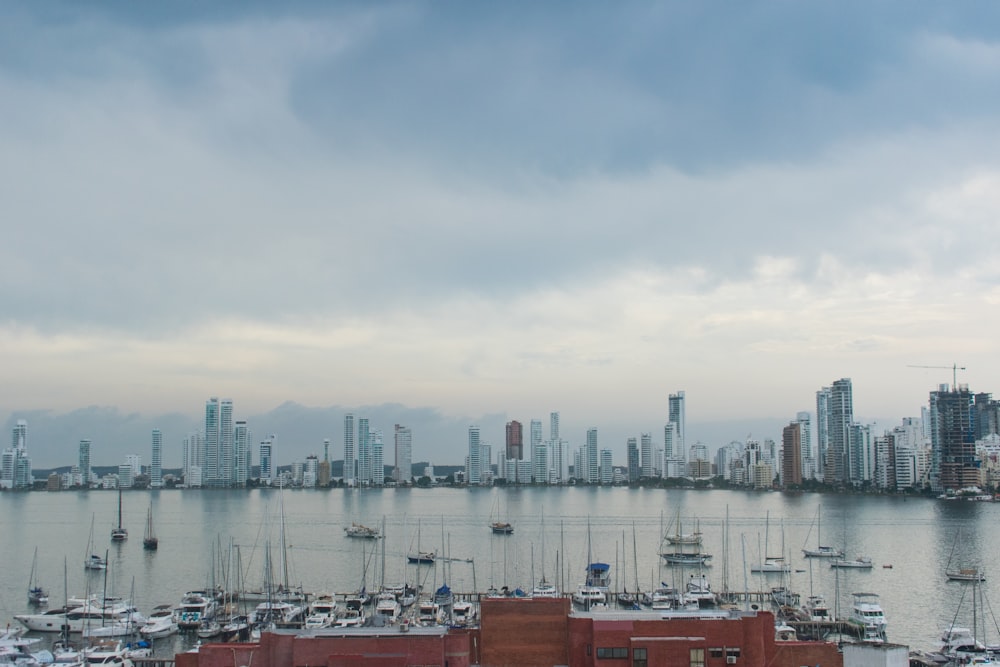 city skyline under cloudy sky during daytime