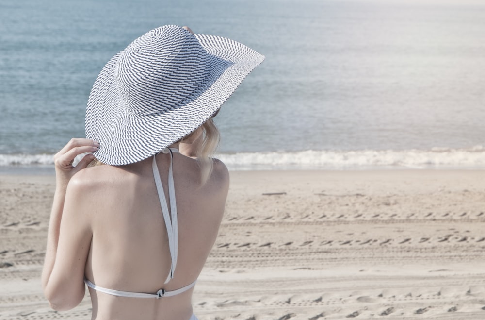 woman wearing grey sun hat during daytime