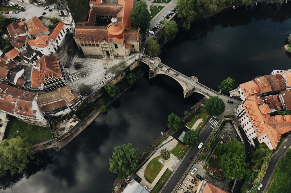 building and body of water during daytime top-view photography