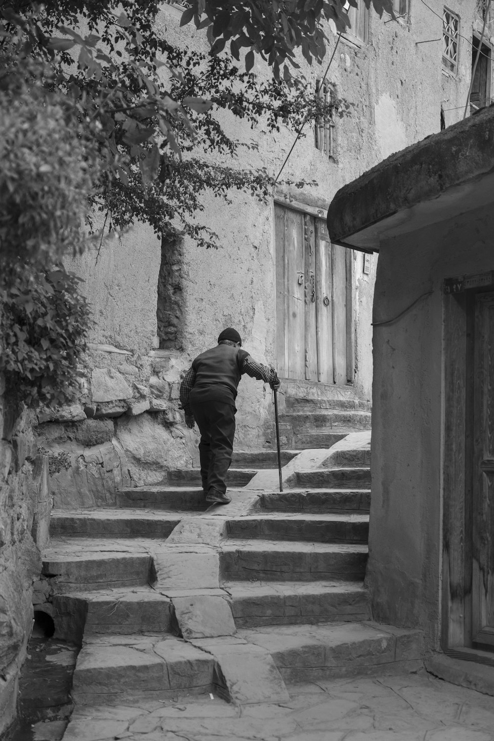 man walking stairway during daytime