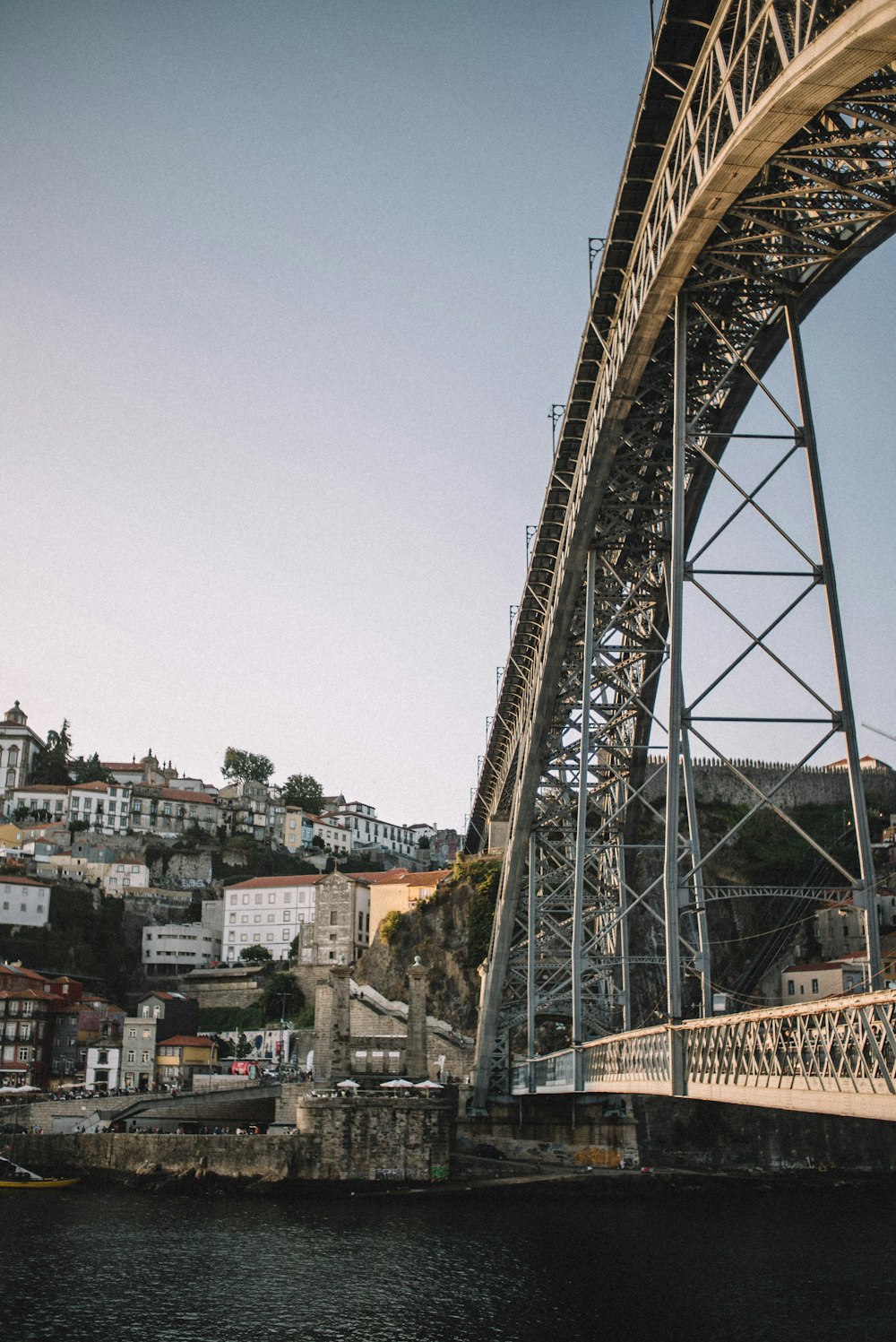 bridge near city during daytime