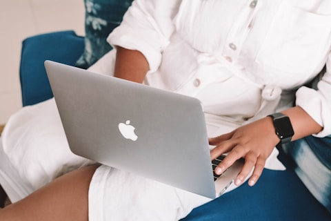man browsing laptop