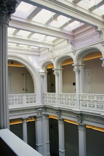 Panoramic shot capturing the open floor plan and high ceilings that create an airy event atmosphere