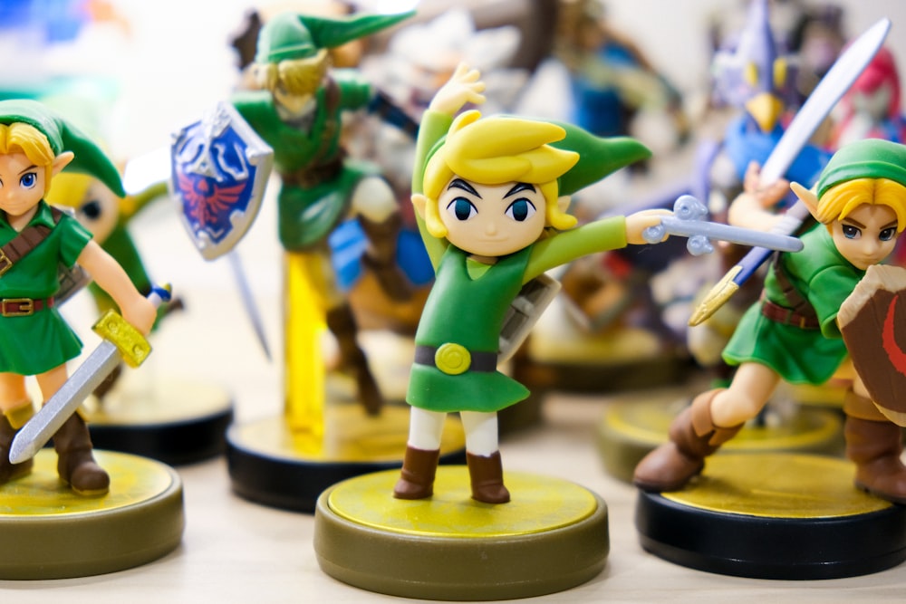 selective focus photography of Link vinyl figures