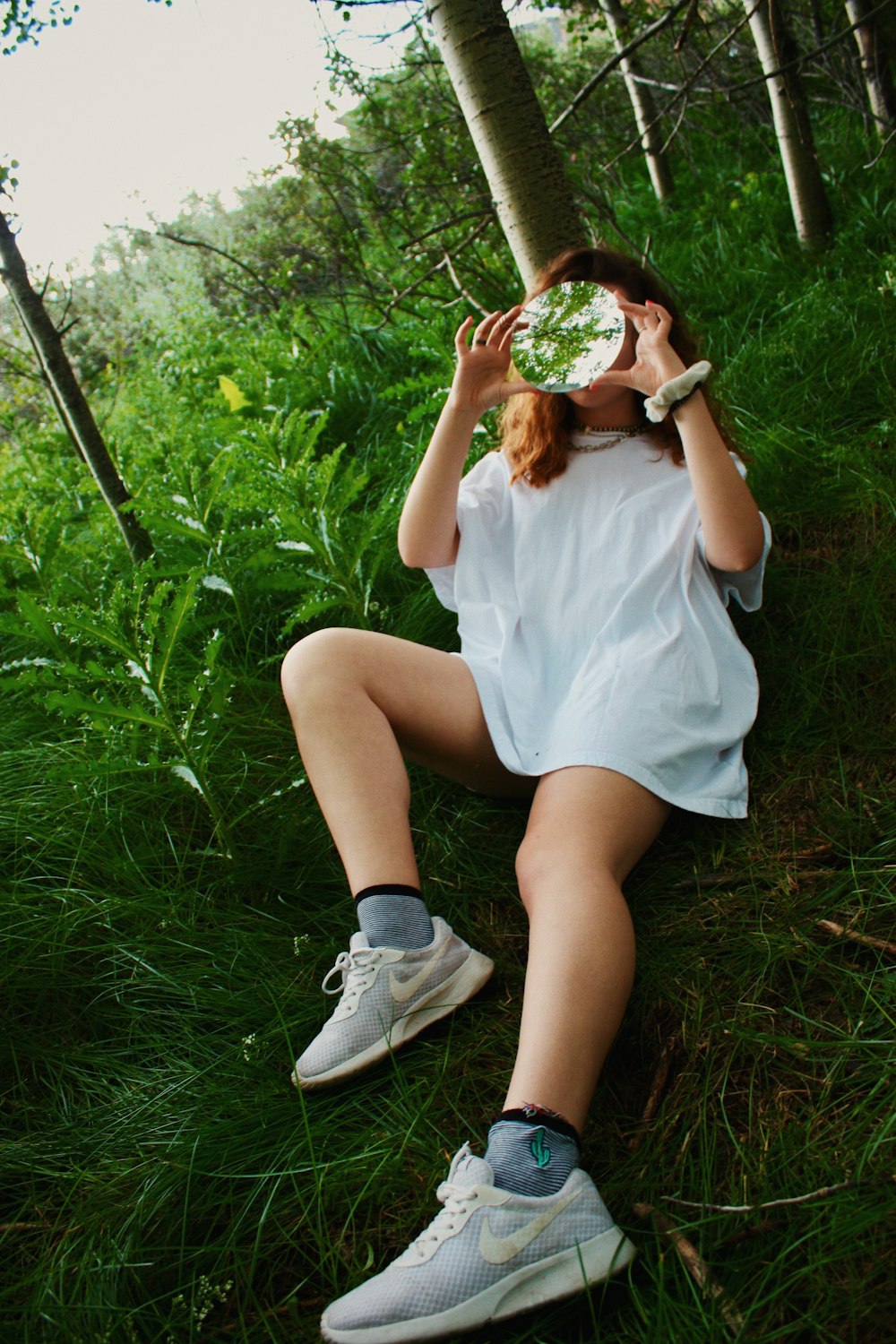 woman sitting on the ground