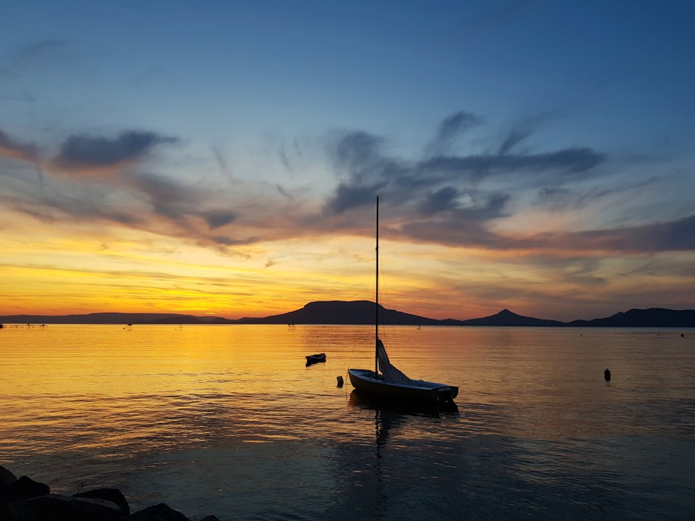 white sailing boat