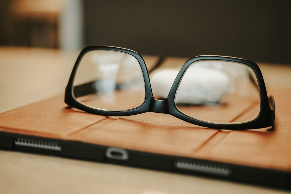 black-framed eyeglasses
