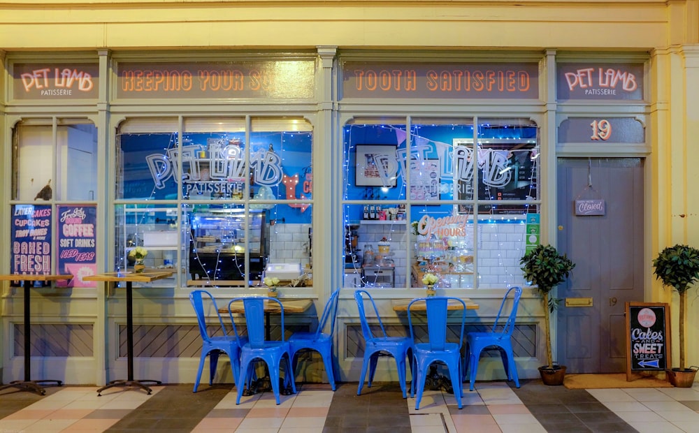 empty blue metal chairs