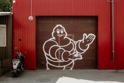garage tire shop gate in Nigeria with michelin logo