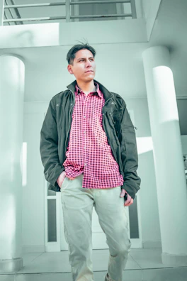 Reda, the founder, smiling confidently while reviewing a property maintenance checklist.