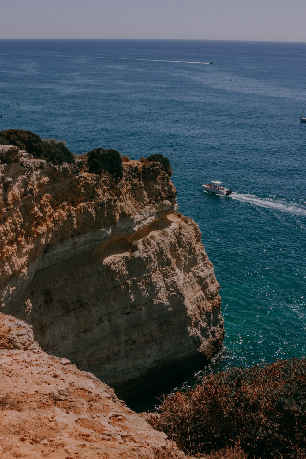 motorboat near cliff