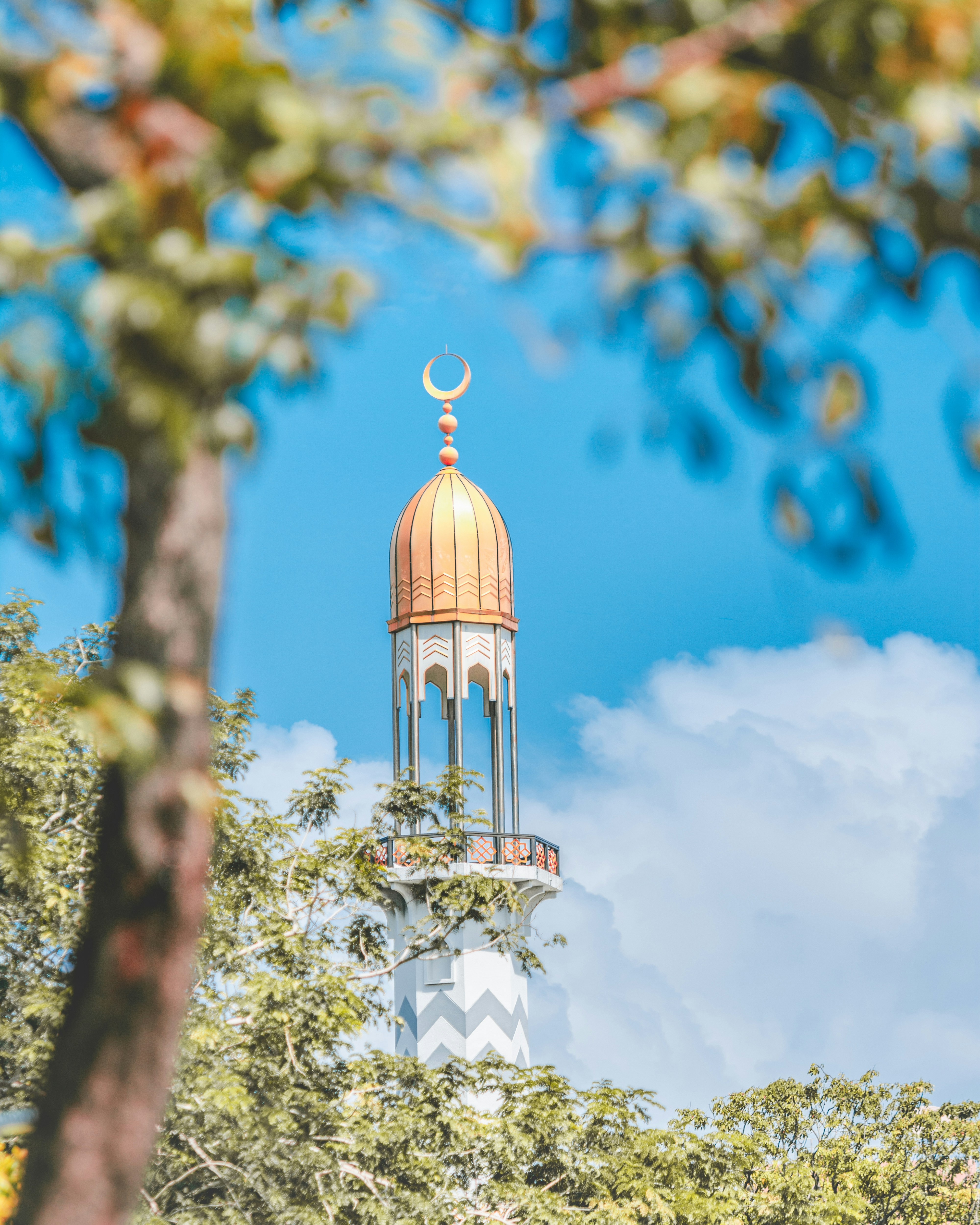 white and brown lighthouse during daytime