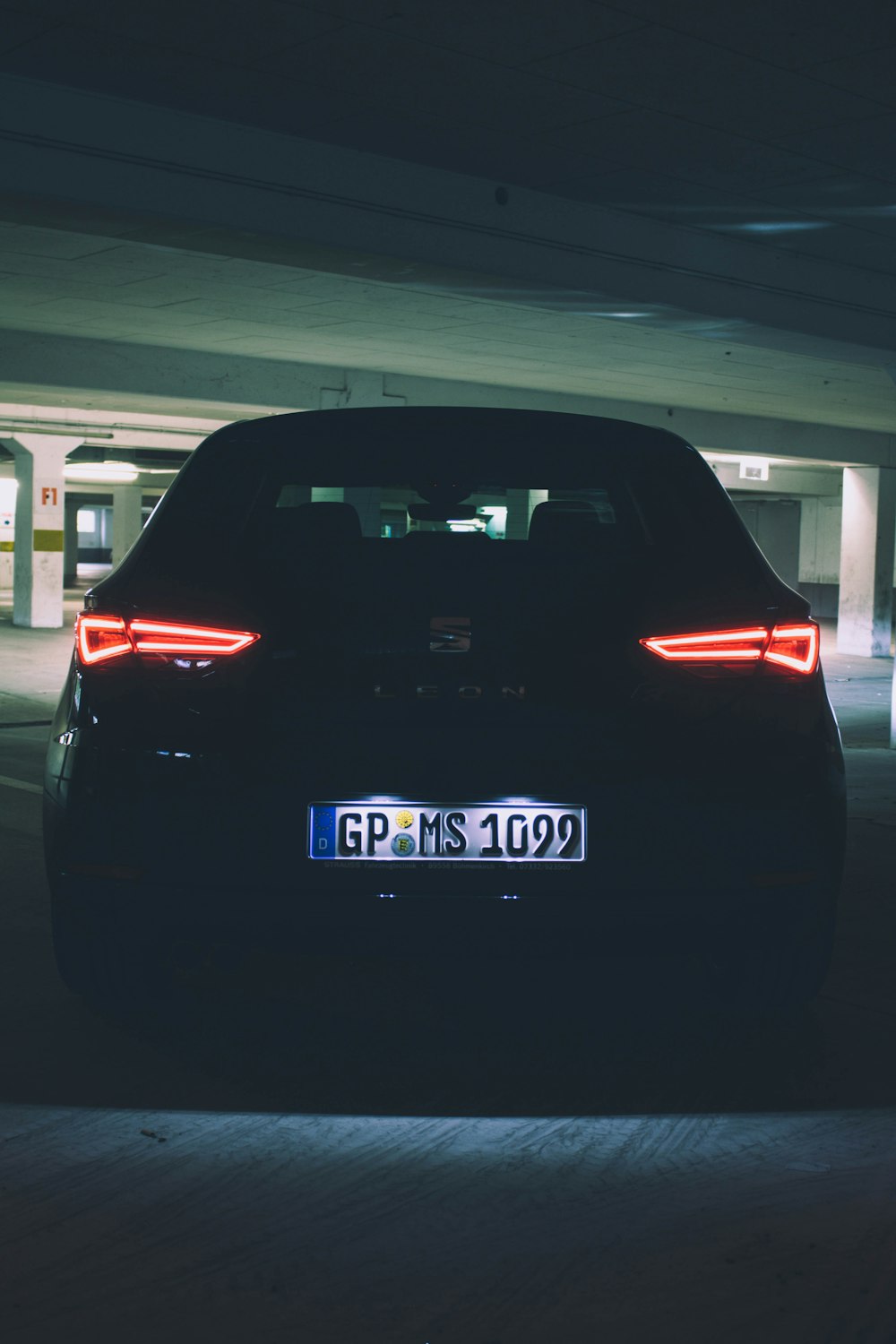 shallow focus photo of black car