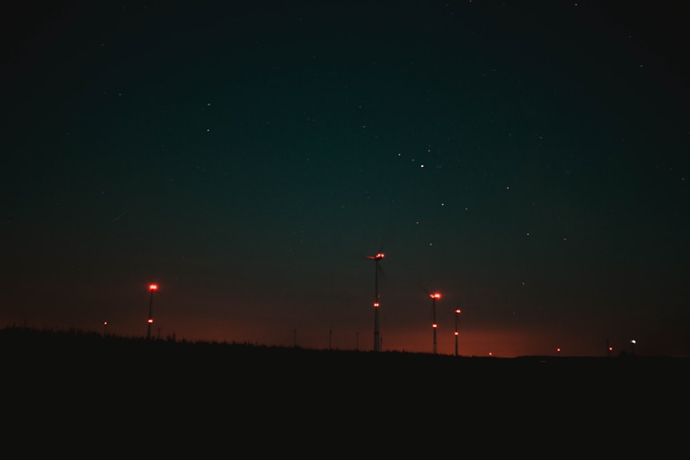 the night sky is lit up by street lights